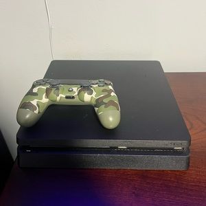 PlayStation 4 Slim 1TB with DualShock 4 Controller